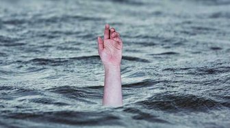 Hand reaching from water, symbolizing a political exit after Billie Jo Underwood defeated Tucker Dorsey in an election