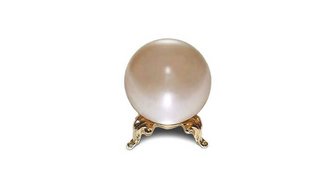 Fairhope election decision delayed; a crystal ball on ornate stand symbolizes the upcoming vote for change of government