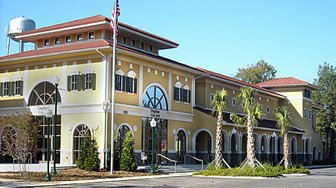 Daphne City Hall exterior; American flag flying, where the city council will interview applicants for a vacant seat