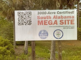 Sign advertising the vacant South Alabama Mega Site, a 3000-acre industrial property purchased by Baldwin County in 2012