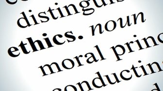 Close-up photo highlights ethics definition, referencing the Ethics Commission’s dismissal of an investigation