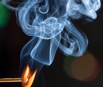 Burning match with smoke rising, symbolizing controversy surrounding Baldwin County commissioner Dorsey’s firings related ...