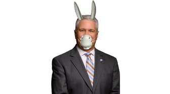 Mayor wearing a donkey mask, symbolizing criticism over Fairhope’s public gathering decision during health concerns