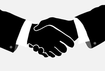 Handshake between two figures in suits, symbolizing Ripp Report’s new ability to support political candidates