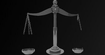 Scales of justice against a dark background, symbolizing questions about fairness in the Murray Lawrence case investigation
