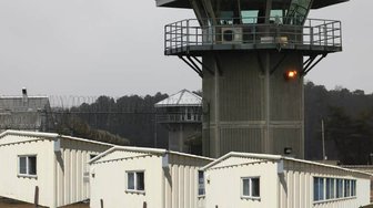 Alabama prison complex, symbolizing state decisions that cost billions and reflect political corruption