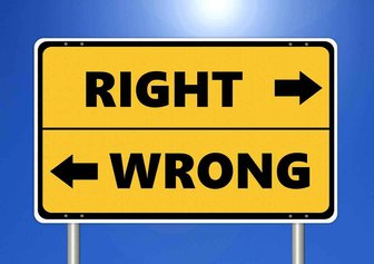 Signpost pointing Right and Wrong, symbolizing conflict of interest concerns within Fairhope City Council decisions