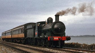 Vintage steam train traveling through Baldwin County, illustrating independent municipal systems